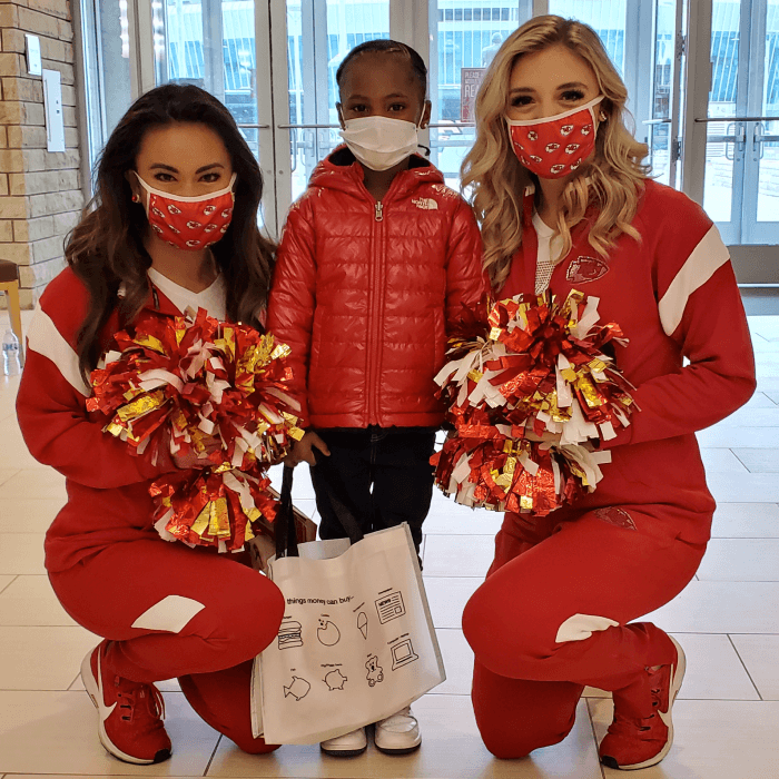Image of kids from the free dental checkup at Arrowhead Stadium
